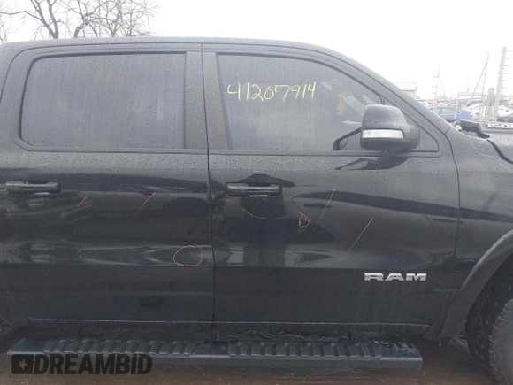2021 Ram 1500 Laramie with VIN 1C6SRFJT6MN580803, listed as a IAAI auction lot 41207914 with 56,891 mi miles and . Bid and sale history available at DreamBid. Image 14.