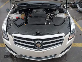 2013 Cadillac ATS Luxury z VIN 1G6AB5RA1D0156368, wystawiony jako IAAI lot #41283194 z przebiegiem 95 770 mil mil oraz . Historia ofert i sprzedaży dostępna na DreamBid. Obrazek 10.
