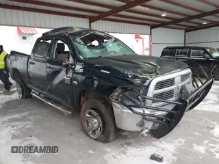 2011 Ram 2500 SLT z VIN 3D7TT2CT5BG521984, wystawiony jako IAAI lot #41599954 z przebiegiem 159 676 mil mil oraz . Historia ofert i sprzedaży dostępna na DreamBid. Obrazek 1.