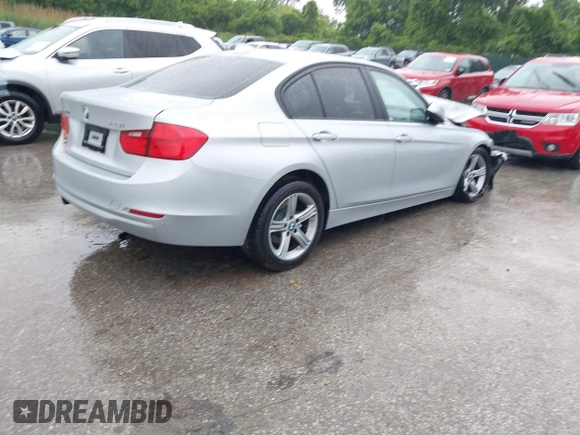 2013 BMW 3 Series 328i xDrive with VIN WBA3B5G56DNS05222, listed as a IAAI auction lot 42351739 with 98,399 mi miles and . Bid and sale history available at DreamBid. Image 4.
