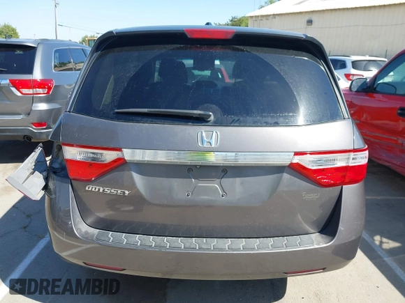 2012 Honda Odyssey EX-L with VIN 5FNRL5H65CB012428, listed as a IAAI auction lot 42164272 with 256,253 mi miles and . Bid and sale history available at carsss.com. Image 16.