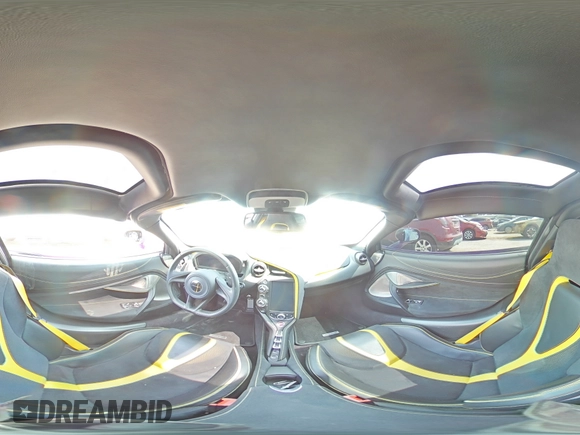 2018 McLaren 720S z VIN SBM14DCA2JW000849, wystawiony jako Copart lot #71075974 z przebiegiem Nie podano mil oraz Szkody całkowita. Historia ofert i sprzedaży dostępna na DreamBid. Obrazek 13.