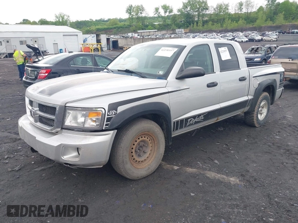 2008 Dodge Dakota SLT z VIN 1D7HW48N38S536147, wystawiony jako IAAI lot #42230957 z przebiegiem 140 571 mil mil oraz . Historia ofert i sprzedaży dostępna na DreamBid. Obrazek 2.