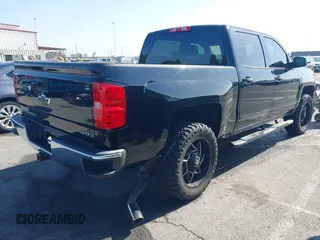 2017 Chevrolet Silverado 1500 LT with VIN 3GCPCREC5HG471758, listed as a IAAI auction lot 41991708 with 77,056 mi miles. Bid and sale history available at carsss.com. Image 4.