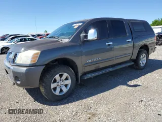 2005 Nissan Titan LE z VIN 1N6BA07B95N571880, wystawiony jako Copart lot #57527435 z przebiegiem 199 577 mil mil oraz Szkoda całkowita • Salvage title. Historia ofert i sprzedaży dostępna na DreamBid. Obrazek 1.