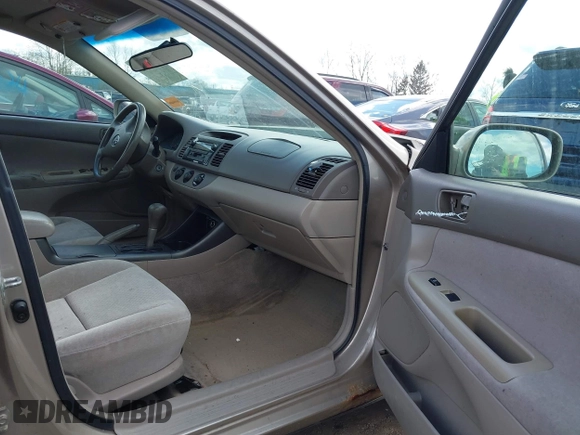 2003 Toyota Camry LE with VIN 4T1BE32KX3U123873, listed as a IAAI auction lot 42085492 with 166,901 mi miles and . Bid and sale history available at DreamBid. Image 5.
