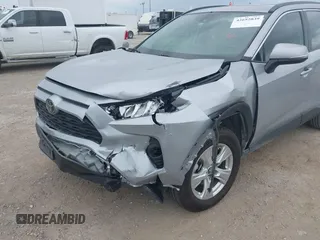 2020 Toyota RAV4 XLE with VIN 2T3W1RFV4LW094687, listed as a IAAI auction lot 42652039 with 56,693 mi miles and . Bid and sale history available at DreamBid. Image 6.