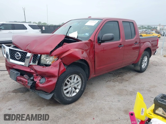 2014 Nissan Frontier SV with VIN 1N6AD0ER7EN765231, listed as a IAAI auction lot 41932925 with 110,021 mi miles and . Bid and sale history available at DreamBid. Image 2.