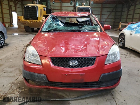 2009 Kia Rio LX with VIN KNADE243696572877, listed as a Copart auction lot 66075394 with 0 mi miles and Non Repairable. Bid and sale history available at carsss.com. Image 5.