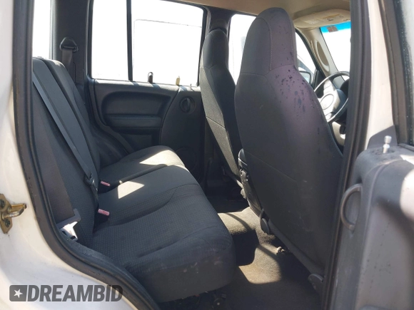 2003 Jeep Liberty Sport with VIN 1J4GL48K93W511690, listed as a IAAI auction lot 42066355 with 115,008 mi miles. Bid and sale history available at carsss.com. Image 8.