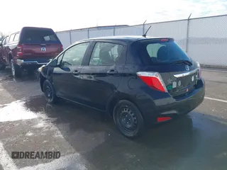 2014 Toyota Yaris L with VIN JTDKTUD36ED586456, listed as a IAAI auction lot 41888730 with 92,742 mi miles. Bid and sale history available at carsss.com. Image 3.