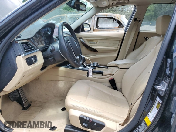 2015 BMW 3 Series 328i xDrive with VIN WBA3B5G58FNS15964, listed as a Copart auction lot 61783435 with 149,974 mi miles and Salvage title. Bid and sale history available at DreamBid. Image 7.