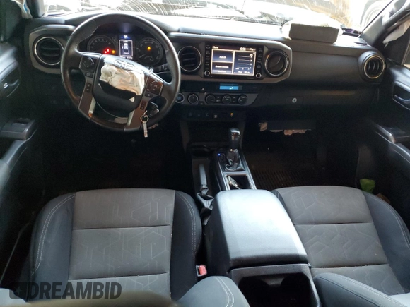 2021 Toyota Tacoma SR with VIN 3TMCZ5AN6MM393306, listed as a Copart auction lot 41483325 with 57,217 mi miles and Salvage title. Bid and sale history available at DreamBid. Image 8.
