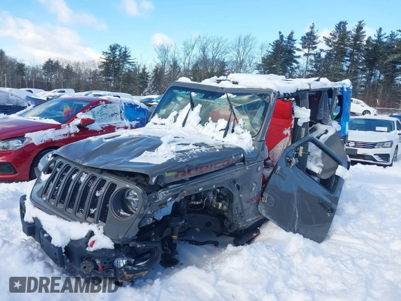 2020 Jeep Wrangler Unlimited Rubicon z VIN 1C4HJXFN5LW176104, wystawiony jako IAAI lot #41332511 z przebiegiem 70 428 mil mil oraz . Historia ofert i sprzedaży dostępna na DreamBid. Obrazek 6.