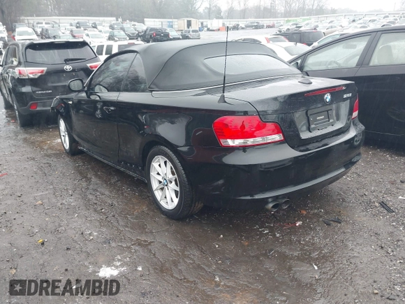2011 BMW 1 Series 128i with VIN WBAUL7C52BVM79176, listed as a IAAI auction lot 41387249 with 99,145 mi miles and . Bid and sale history available at carsss.com. Image 3.