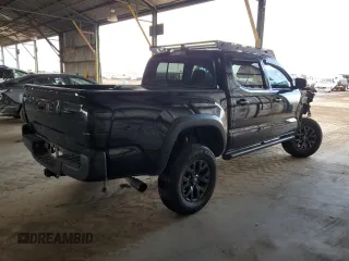 2020 Toyota Tacoma SR5 z VIN 5TFCZ5AN0LX229364, wystawiony jako Copart lot #55695505 z przebiegiem 69 908 mil mil oraz Szkoda całkowita • Salvage title. Historia ofert i sprzedaży dostępna na DreamBid. Obrazek 3.