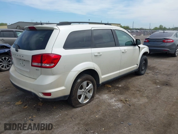 2012 Dodge Journey SXT with VIN 3C4PDCBG4CT372642, listed as a IAAI auction lot 42238499 with 172,033 mi miles and . Bid and sale history available at DreamBid. Image 4.