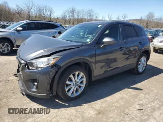 2014 Mazda CX-5 Grand Touring with VIN JM3KE4DY4E0422739, listed as a Copart auction lot 53234745 with 54,152 mi miles and Salvage Title. Bid and sale history available at carsss.com. Image 1.