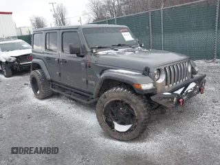2019 Jeep Wrangler Unlimited Sahara with VIN 1C4HJXEG8KW533339, listed as a IAAI auction lot 40963653 with 69,202 mi miles and . Bid and sale history available at DreamBid. Image 1.