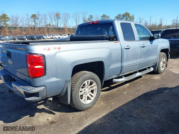2016 Chevrolet Silverado 1500 LT with VIN 1GCVKREC6GZ125162, listed as a IAAI auction lot 41704884 with 100,656 mi miles. Bid and sale history available at carsss.com. Image 4.