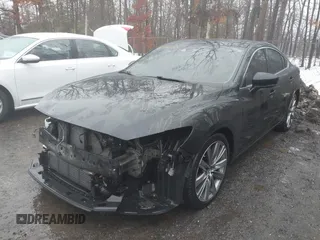 2018 Mazda 6 Grand Touring Reserve with VIN JM1GL1WY1J1308749, listed as a IAAI auction lot 41571220 with 113,041 mi miles and . Bid and sale history available at carsss.com. Image 2.