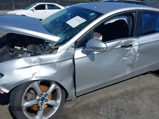 2013 Ford Fusion SE z VIN 3FA6P0H96DR372155, wystawiony jako IAAI lot #42049565 z przebiegiem 120 180 mil mil oraz . Historia ofert i sprzedaży dostępna na DreamBid. Obrazek 6.