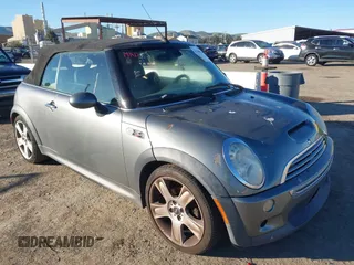 2005 MINI Convertible S with VIN WMWRH33405TF80405, listed as a IAAI auction lot 41340651 with 149,957 mi miles and . Bid and sale history available at DreamBid. Image 1.
