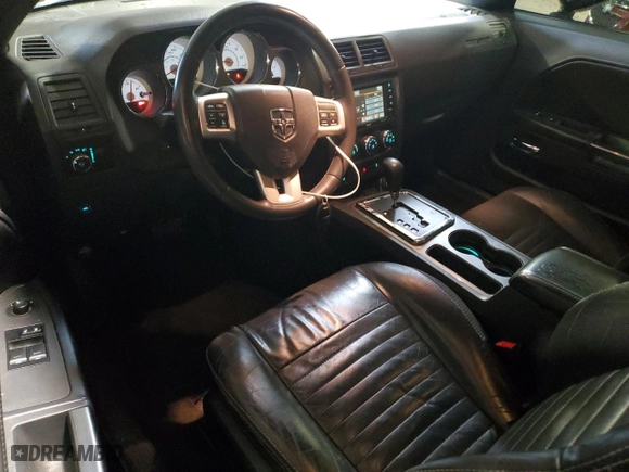 2013 Dodge Challenger SXT with VIN 2C3CDYAG5DH725000, listed as a Copart auction lot 82157004 with 188,278 mi miles and Salvage Title. Bid and sale history available at carsss.com. Image 8.