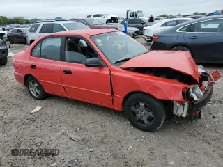 2001 Hyundai Accent GL with VIN KMHCG45C81U219104, listed as a Copart auction lot 51597985 with 157,597 mi miles and Salvage Title. Bid and sale history available at carsss.com. Image 4.