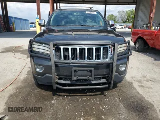 2011 Jeep Grand Cherokee Laredo z VIN 1J4RR4GG2BC518713, wystawiony jako Copart lot #55947995 z przebiegiem 119 783 mil mil oraz Szkoda całkowita • Salvage title. Historia ofert i sprzedaży dostępna na DreamBid. Obrazek 5.