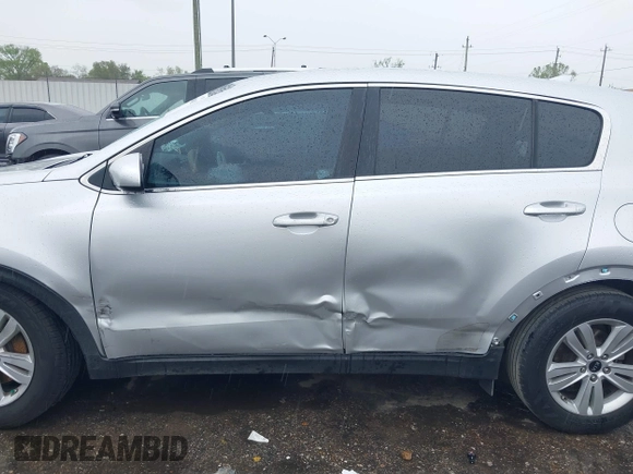 2018 Kia Sportage LX with VIN KNDPM3AC7J7337951, listed as a IAAI auction lot 41900482 with 105,857 mi miles and . Bid and sale history available at carsss.com. Image 14.