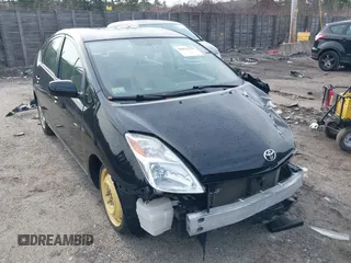 2005 Toyota Prius with VIN JTDKB22U353060181, listed as a IAAI auction lot 42031555 with 165,015 mi miles. Bid and sale history available at carsss.com. Image 1.