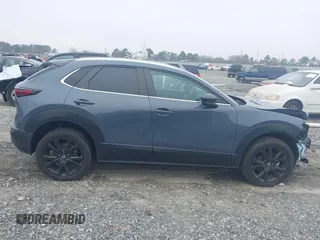 2023 Mazda CX-30 S Carbon Edition with VIN 3MVDMBCM5PM514304, listed as a IAAI auction lot 41795899 with 31,993 mi miles and . Bid and sale history available at DreamBid. Image 13.