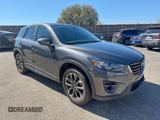 2016 Mazda CX-5 Grand Touring with VIN JM3KE2DY7G0918397, listed as a Copart auction lot 50564905 with 103,660 mi miles and Clean Title. Bid and sale history available at carsss.com. Image 1.