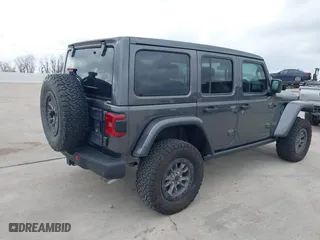 2022 Jeep Wrangler Unlimited Rubicon 392 with VIN 1C4JJXSJXNW102670, listed as a IAAI auction lot 41499424 with 83,168 mi miles. Bid and sale history available at carsss.com. Image 4.