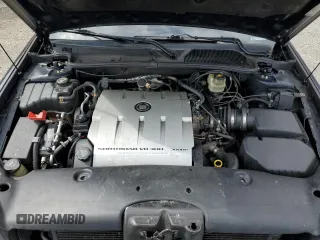2004 Cadillac DeVille DTS z VIN 1G6KF579X4U203102, wystawiony jako Copart lot #50426955 z przebiegiem 157 290 mil mil oraz Szkody całkowita. Historia ofert i sprzedaży dostępna na DreamBid. Obrazek 11.