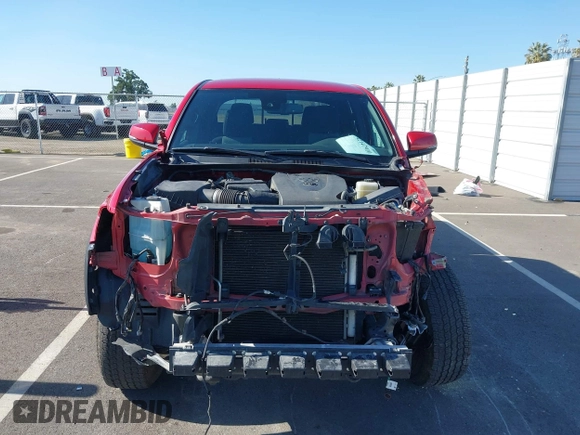 2021 Toyota Tacoma SR z VIN 5TFCZ5AN8MX247421, wystawiony jako IAAI lot #42147910 z przebiegiem 94 467 mil mil oraz . Historia ofert i sprzedaży dostępna na DreamBid. Obrazek 13.