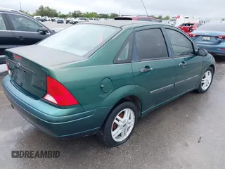 2000 Ford Focus LX with VIN 1FAFP33P8YW336316, listed as a IAAI auction lot 41904496 with 215,100 mi miles and . Bid and sale history available at carsss.com. Image 4.