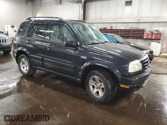 2003 Suzuki Grand Vitara z VIN JS3TD62V234100175, wystawiony jako Copart lot #47174605 z przebiegiem 88 451 mil mil oraz Szkody całkowita. Historia ofert i sprzedaży dostępna na DreamBid. Obrazek 4.