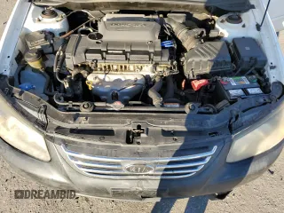 2009 Kia Spectra EX z VIN KNAFE222395623700, wystawiony jako Copart lot #86279424 z przebiegiem 195 991 mil mil oraz Szkoda całkowita • Salvage title. Historia ofert i sprzedaży dostępna na DreamBid. Obrazek 12.