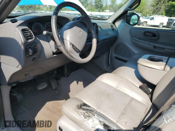 2002 Ford F-150 XL z VIN 1FTRX18LX2NA09494, wystawiony jako Copart lot #55255925 z przebiegiem 331 667 mil mil oraz Szkoda całkowita • Salvage title. Historia ofert i sprzedaży dostępna na DreamBid. Obrazek 8.