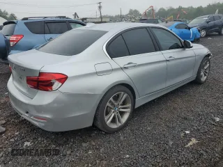 2018 BMW 3 Series 330i with VIN WBA8B9G50JNU98561, listed as a Copart auction lot 61293325 with 106,656 mi miles and Clean title. Bid and sale history available at DreamBid. Image 3.