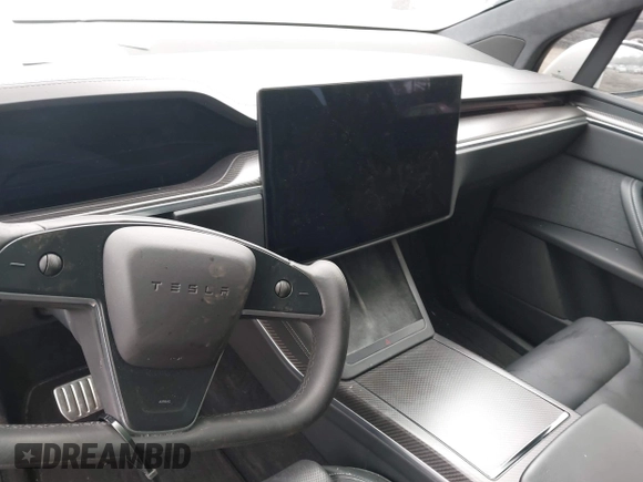 2022 Tesla Model X Plaid z VIN 7SAXCBE67NF339557, wystawiony jako IAAI lot #41825360 z przebiegiem 70 mil mil oraz . Historia ofert i sprzedaży dostępna na DreamBid. Obrazek 18.