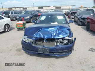 2018 BMW 3 Series 320i with VIN WBA8E1G56JNU92997, listed as a IAAI auction lot 42039869 with 105,085 mi miles. Bid and sale history available at carsss.com. Image 11.