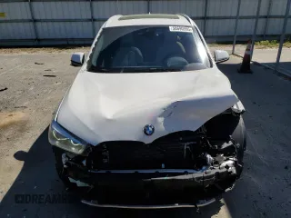 2018 BMW X1 sDrive28i with VIN WBXHU7C31J5L06010, listed as a Copart auction lot 50690995 with 44,092 mi miles and Salvage Title. Bid and sale history available at carsss.com. Image 5.