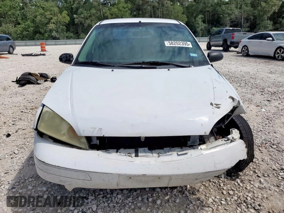 2007 Ford Focus S with VIN 1FAHP34NX7W225626, listed as a Copart auction lot 58202395 with 157,844 mi miles and Salvage title. Bid and sale history available at DreamBid. Image 5.