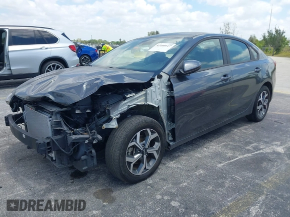 2021 Kia Forte LXS with VIN 3KPF24AD1ME353955, listed as a IAAI auction lot 42160127 with 61,719 mi miles. Bid and sale history available at carsss.com. Image 2.