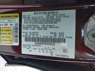 2015 Ford Fusion Titanium with VIN 3FA6P0K93FR226162, listed as a IAAI auction lot 42111564 with 116,805 mi miles. Bid and sale history available at carsss.com. Image 9.