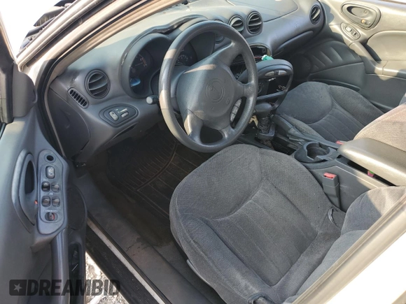 2000 Pontiac Grand Am SE1 with VIN 1G2NF52T6YC525801, listed as a Copart auction lot 59334335 with Not provided miles and Salvage title. Bid and sale history available at DreamBid. Image 8.
