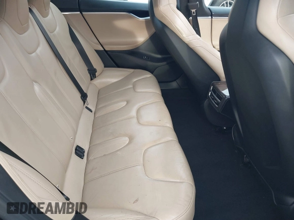 2016 Tesla Model S 70 with VIN 5YJSA1E11GF132015, listed as a IAAI auction lot 41408676 with 137,271 mi miles and . Bid and sale history available at DreamBid. Image 8.
